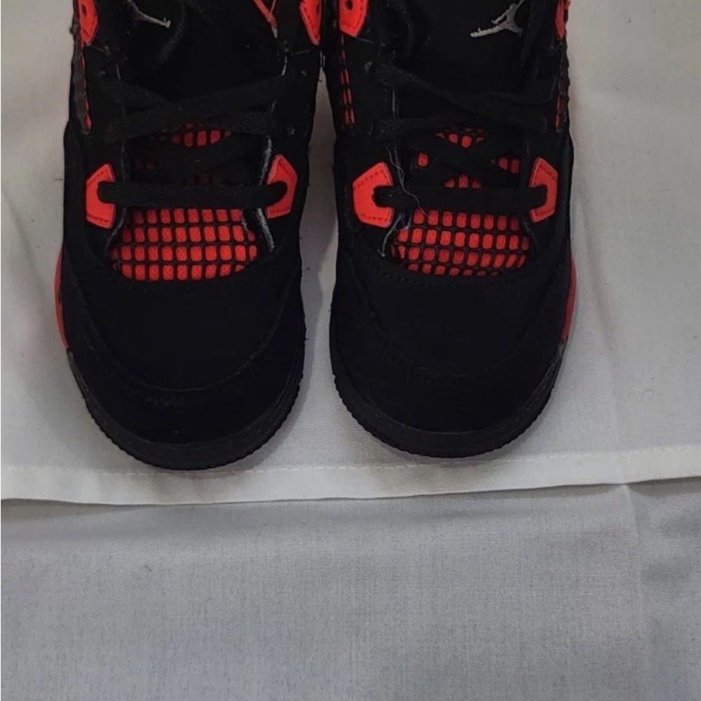 Jordan Black Sneakers with Red Detail